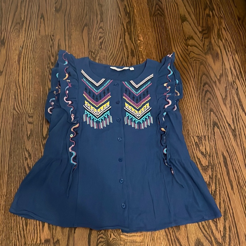Ruffled and embroidered tank